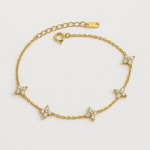 Anthropologie Gold and diamond Star Bracelet